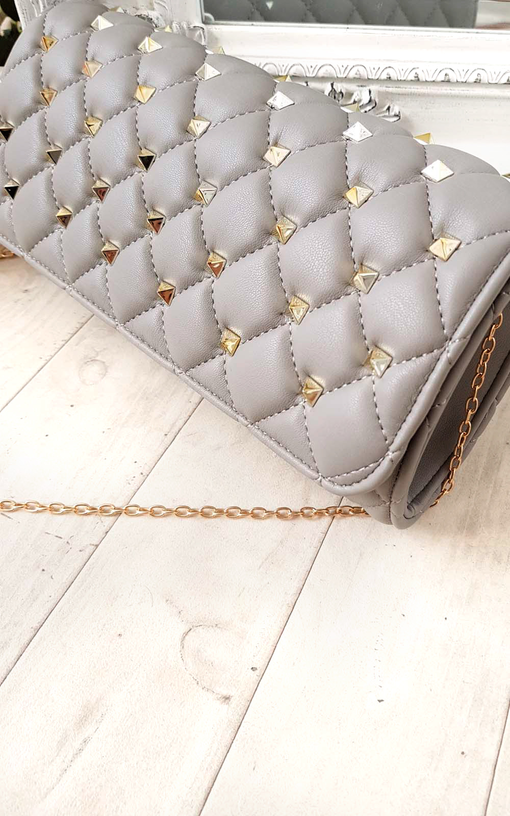 Laylia Quilted Gold Studded Clutch Bag Thumbnail Laylia Quilted Gold Studded Clutch Bag Thumbnail