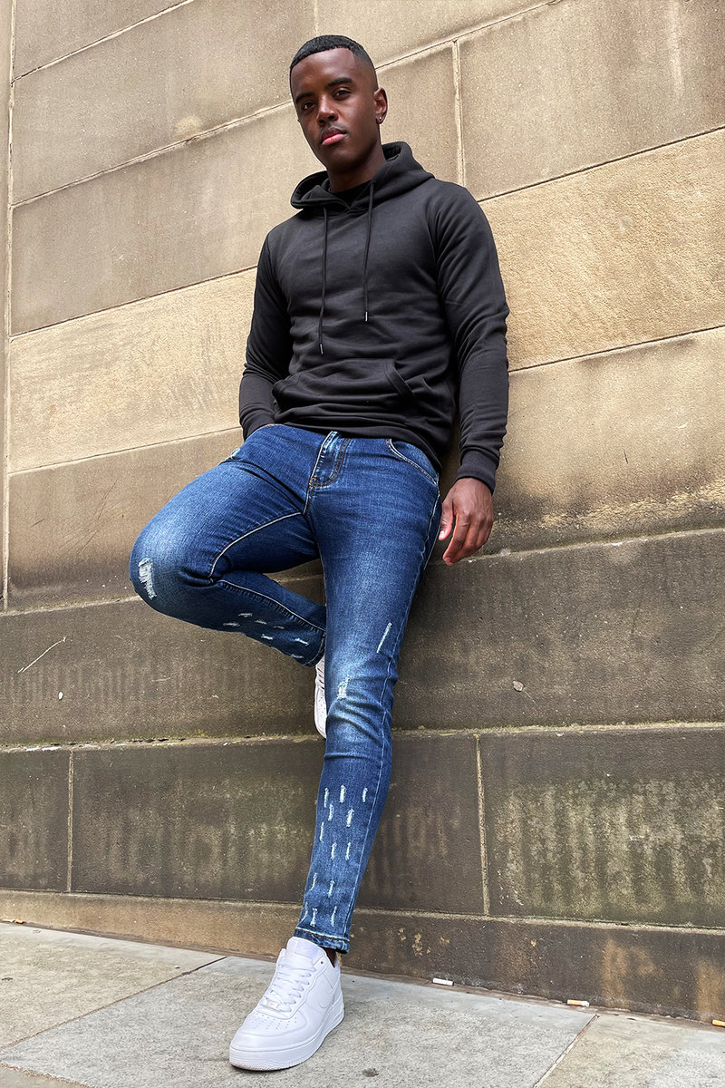 David Skinny Jeans With Knee Rips And Raw Hem David Skinny Jeans With Knee Rips And Raw Hem