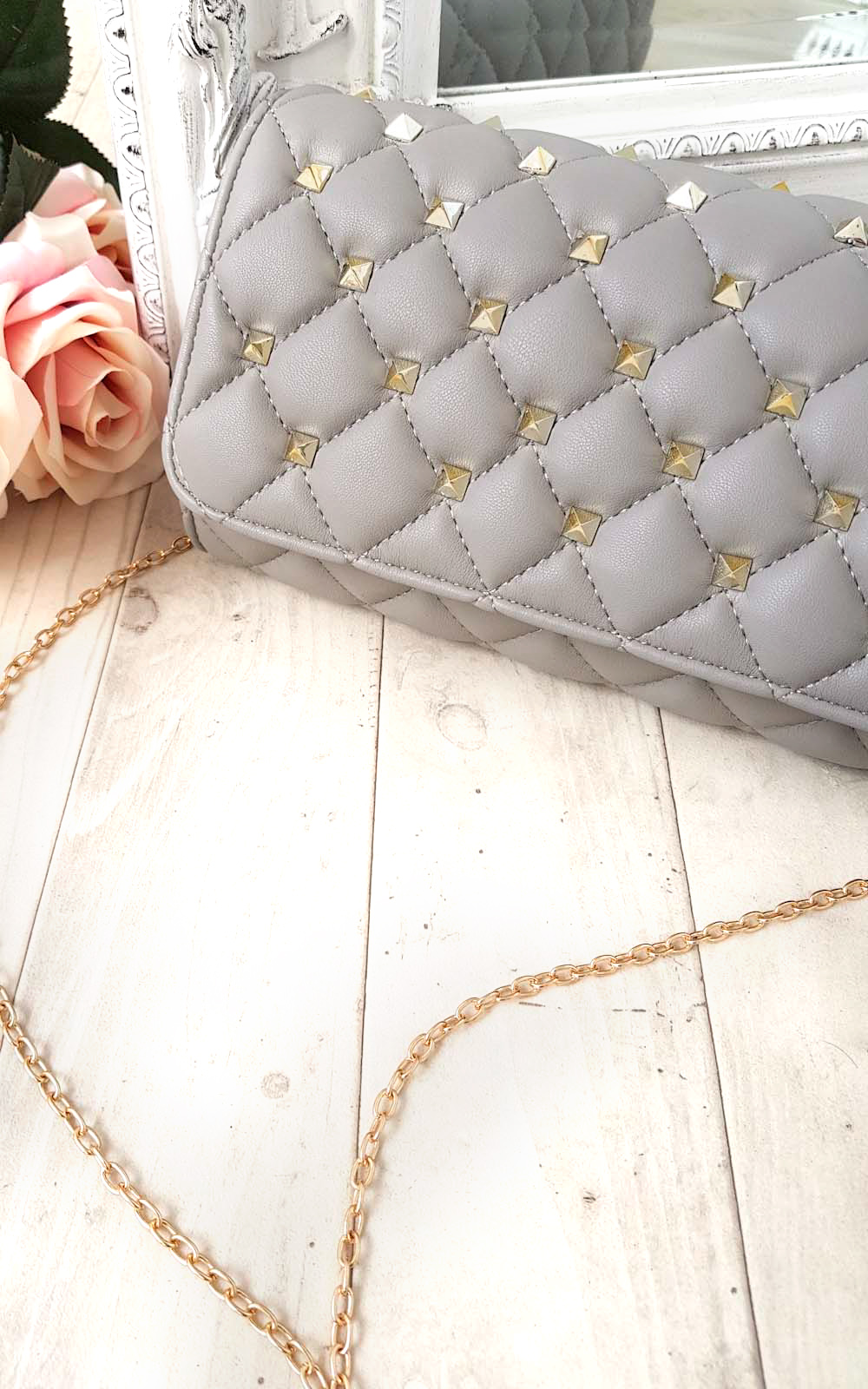 Laylia Quilted Gold Studded Clutch Bag Thumbnail Laylia Quilted Gold Studded Clutch Bag Thumbnail
